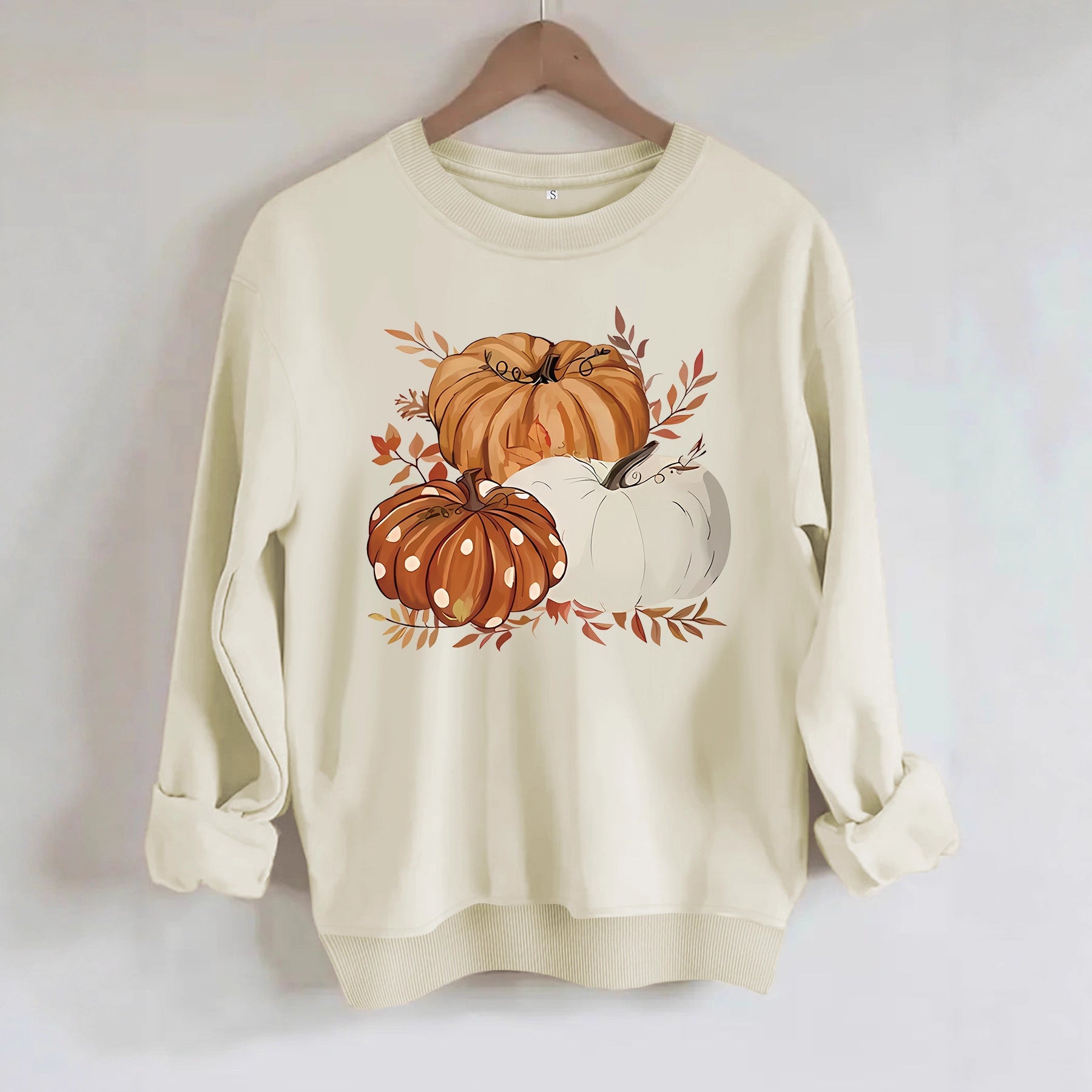 Three pumpkin patterned printed hoodies
