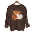 Three pumpkin patterned printed hoodies