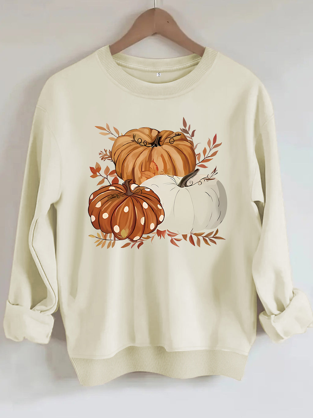 Three pumpkin patterned printed hoodies